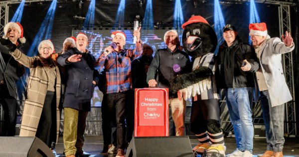 Chorley Christmas Light Switch On People on stage with the Christmas light switch at the Chorley Christmas Light Switch On
