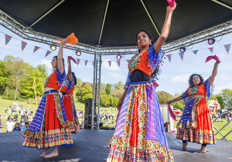 Dancers on stage at event in Preston park