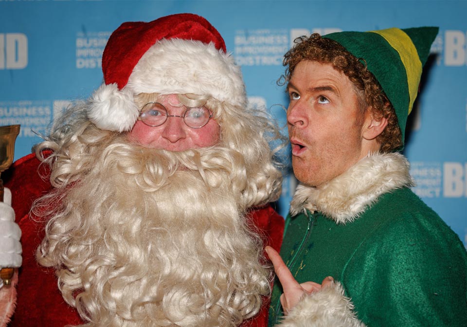 Santa and Buddy the Elf at Christmas event