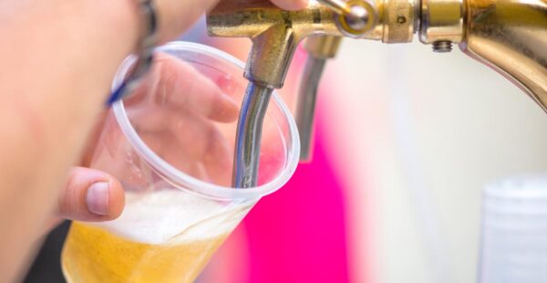 Image of someone pouring a drink