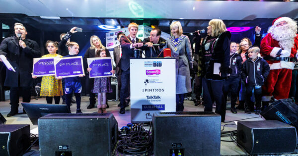 People on stage at Preston Christmas Light Switch on event